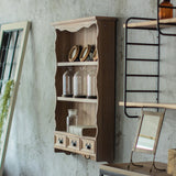 サロンにあるシャビーウッド色壁掛け商品棚【ウォールラック】