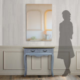 部屋にあるフレームレスミラーとコンソールとサイズがわかるための人シルエット