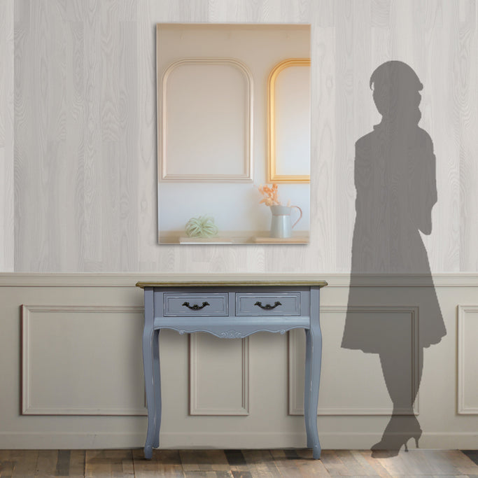 部屋にあるフレームレスミラーとコンソールとサイズがわかるための人シルエット