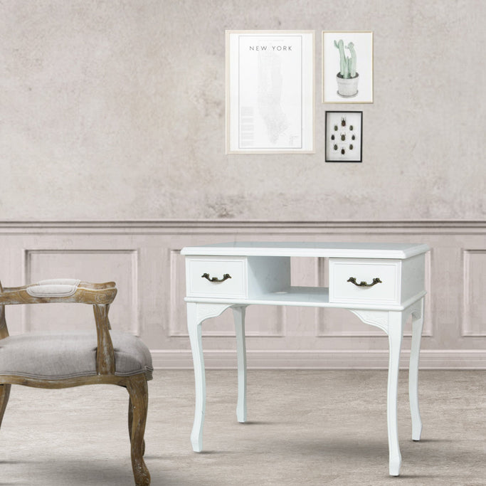 サロンにあるホワイト色ネコ脚ネイルテーブル（ガラス板付き）