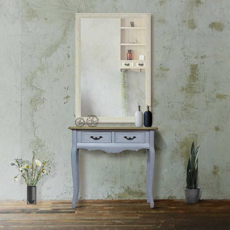 サロンにあるブルーグレー色サロン専用コンソール 【ネコ脚】とホワイトウッド色壁面ミラー