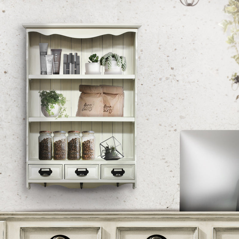 サロンにあるホワイト色壁掛け商品棚【ウォールラック】